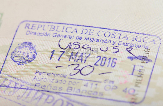 护照页面宏观视图上抵达哥斯达图片
