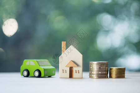 家庭汽车贷款和投资房地产概念的生活成本在风险世界中节省抵押图片