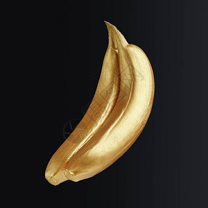 黑色背景上的两个金色香蕉图片