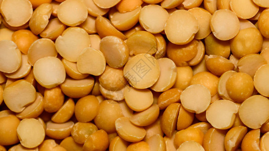 关闭一堆黄色扁豆质地图片素材