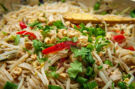 甜美的烹饪垫加鸡米面红铃辣椒豆图片