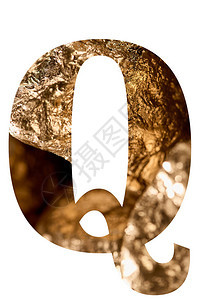 字母Q由闪亮的金色石头制成图片