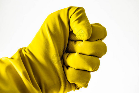 女人手戴黄色橡胶手套握紧f图片