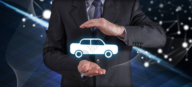 以保护手势与商人进行汽车保险的概念背景图片