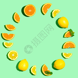 橘子和柠檬的圆形框架头顶平躺图片