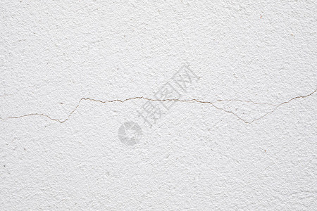 水泥砖表面的白墙裂缝图片