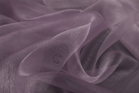 紧贴紫罗丝织物的美丽近身带有图片