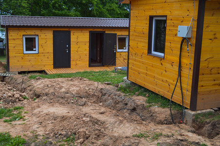 建造郊区模块化速生房建筑小屋的小黄木框架预制生态房图片