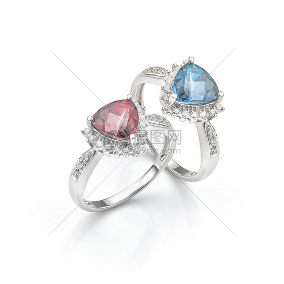 红色和蓝色宝石钻戒指对隔离在白色背景上图片
