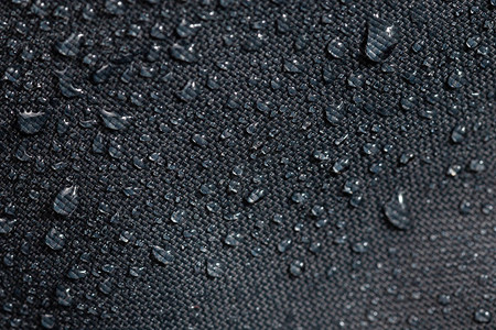 深灰色防水布紧贴在水滴上有选图片素材