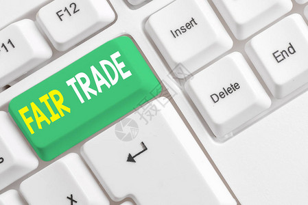 文字书写文本公平贸易商业照片展示了分析制造商向生产商支付的小幅增长白色pc键盘图片