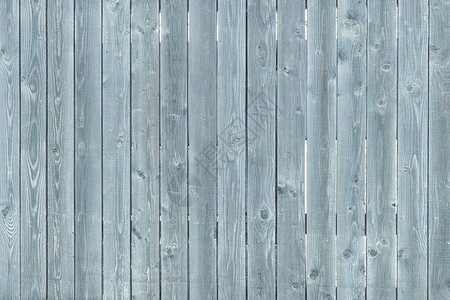 浅绿松石色的旧木栅栏背景图片