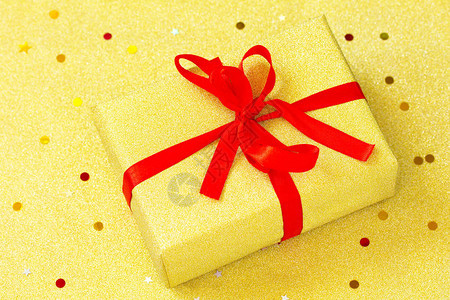 金本位上手工制作的圣诞礼物盒圣诞节赠金盒配红丝图片