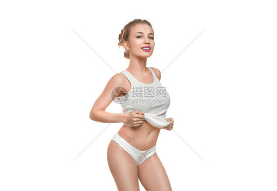 年轻女人用白色背景展示她的腰部图片