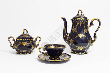 美丽的钴蓝色复古瓷茶具的特写镜头背景图片