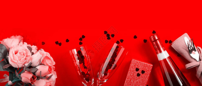 浪漫晚宴概念平板的红背景网络横幅图片