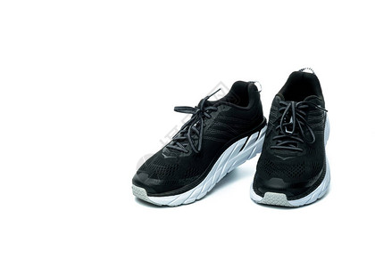 双新跑鞋隔离在白色背景黑色运动鞋具有高耐磨橡胶外底的透气面料运动鞋健身教练的鞋类轻图片