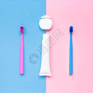 粉红色和蓝色背景的牙齿卫生和口腔牙科护理产品图片