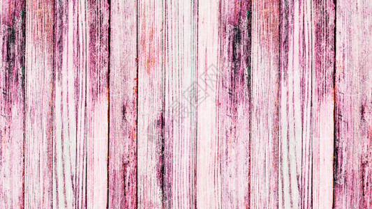 关闭从黑色屏幕移开的粉红色木板行一排水平的木制彩图片