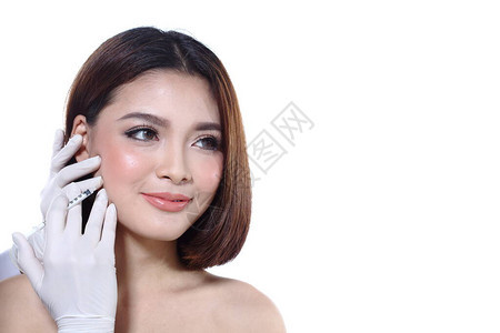 美丽的亚洲女想要在整形手术前检查眼睛鼻子眉毛前额脸颊下巴线图片