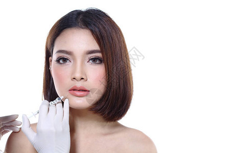 美丽的亚洲女想要在整形手术前检查眼睛鼻子眉毛前额脸颊下巴线图片