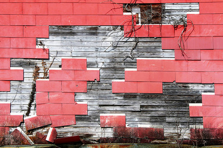 破碎的红色烟灰砖墙壁图片