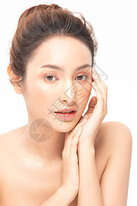 美丽的亚洲女肖像脸与自然皮肤和皮肤护理健康的头发和皮肤特写图片