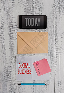 国际贸易文字书写文本全球业务商业照片展示一家公司在世界各地开展业务的贸易和商业系统信封智能手机记事本笔记夹标记背景