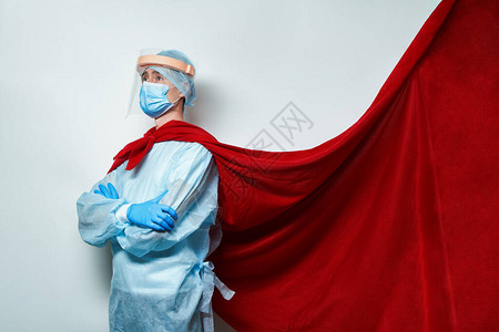在超级英雄披风上戴外科假面罩的医生冠状爆发时超英雄主义医图片