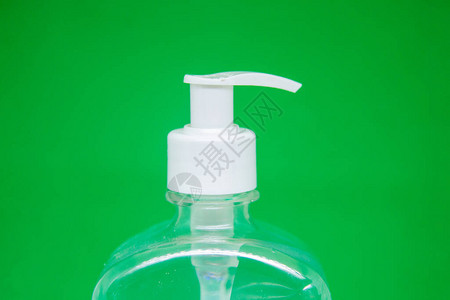 巴西绿色背景白盖着白盖的透明凝胶酒精罐creautivegel图片