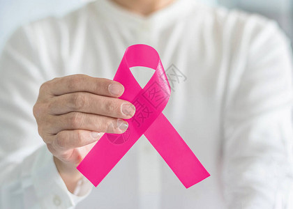 月乳腺癌宣传粉红丝带和女肿瘤疾病的女保健运动概念图片