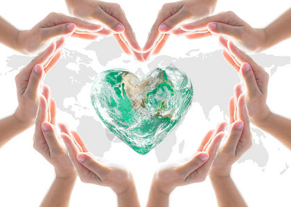 世界心脏日及环境保护概念与爱地球一起掌握在社区志愿者手中美国航天局提供的这幅图象的其中图片