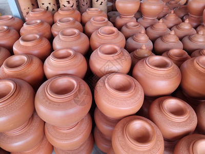 陶瓷制作泰国陶瓷土器橙色和棕色茶地花盆手工艺品背景