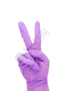 白色背景的紫色医疗手套医疗设备在白图片