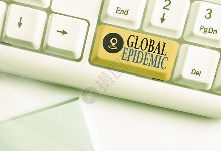 文字书写文本全球流行病商业照片展示了传染病在广阔的地理区域内迅速传播的白色pc键盘图片