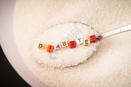 糖尿病概念糖堆上的糖尿病措辞十一月是图片