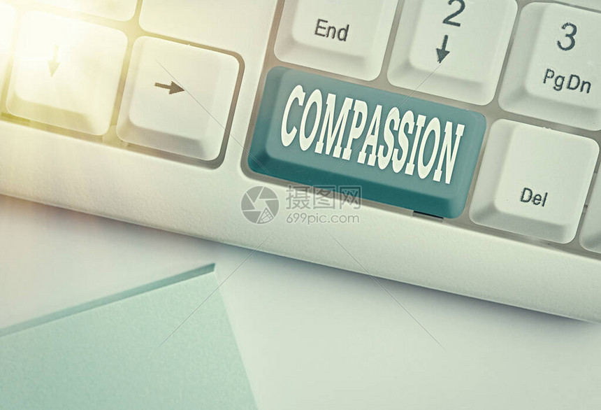 显示同情心的概念手写体概念意义同情和关心他人的痛苦或不幸白色pc键盘高清图片下载-正版图片506627643-摄图网