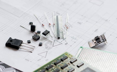 示意图上的电子零件二极管微芯片晶体管集成电路电容器电子路和电子板的背景图片