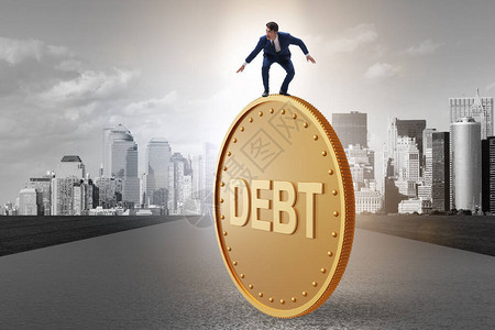 债务和贷款概念中的商人图片