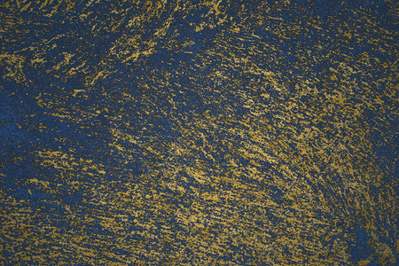花岗岩石地板上的金矿和深蓝色背景图片