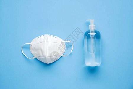 使用KN95手术面罩的酒精用手洗涤剂胶瓶图片