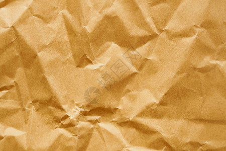 Browncrumpled纸张回收的Kraft背景图片