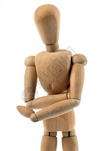 木制铰接式人体模型手臂交叉在白色背景上图片