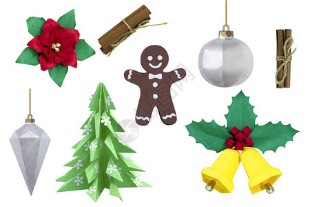 一套纸圣诞节和新年装饰隔离在白色背景上纸艺和工艺手工制作的真实纸制品纸圣诞树玩具一品红铃铛背景图片