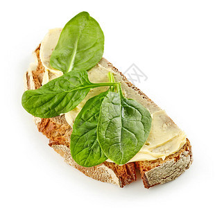 配有菠菜叶的早餐三明治白图片