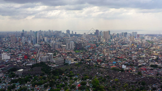 马尼拉市全景大城市的天梯和商务中心等空中观光图片