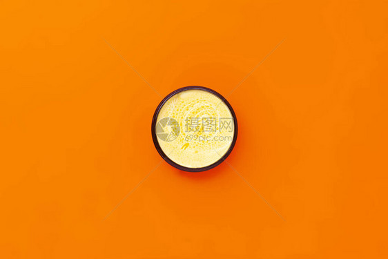 黑色罐子黄奶油和橙色图片