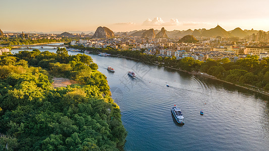 湖光山水夕阳下的桂林市区的漓江风景背景