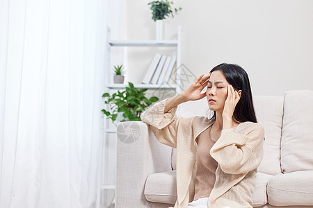 女人节居家女性生病感到头晕头痛背景