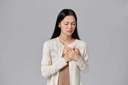 高清图片生病捂着胸口的女性高清图片疲惫的亚洲商人用手捂住额头高清